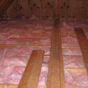 #3 Attic After - Installation of new rolled batten faced insulation.